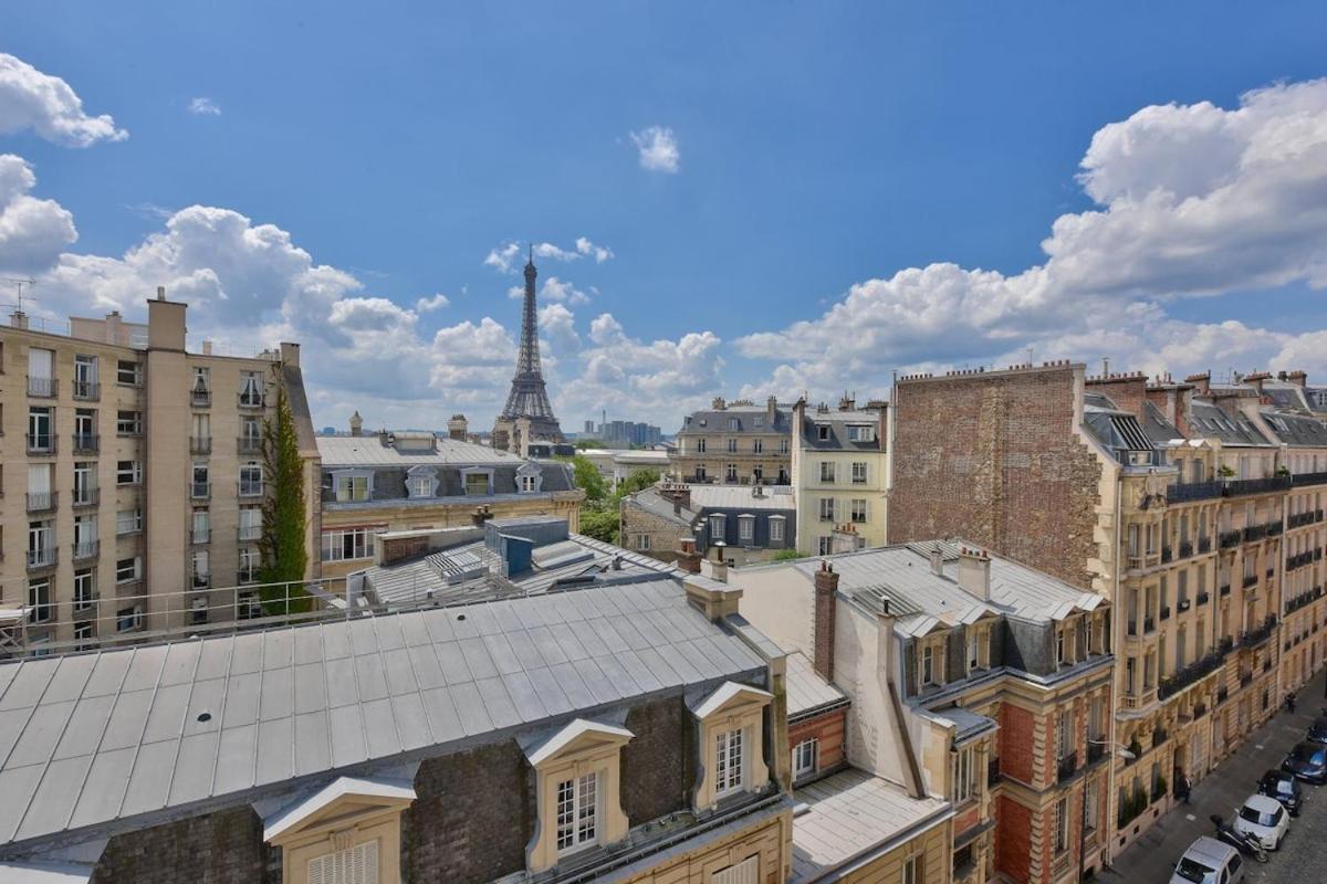 With A Panoramic View Of The Eiffel Tower * Paris