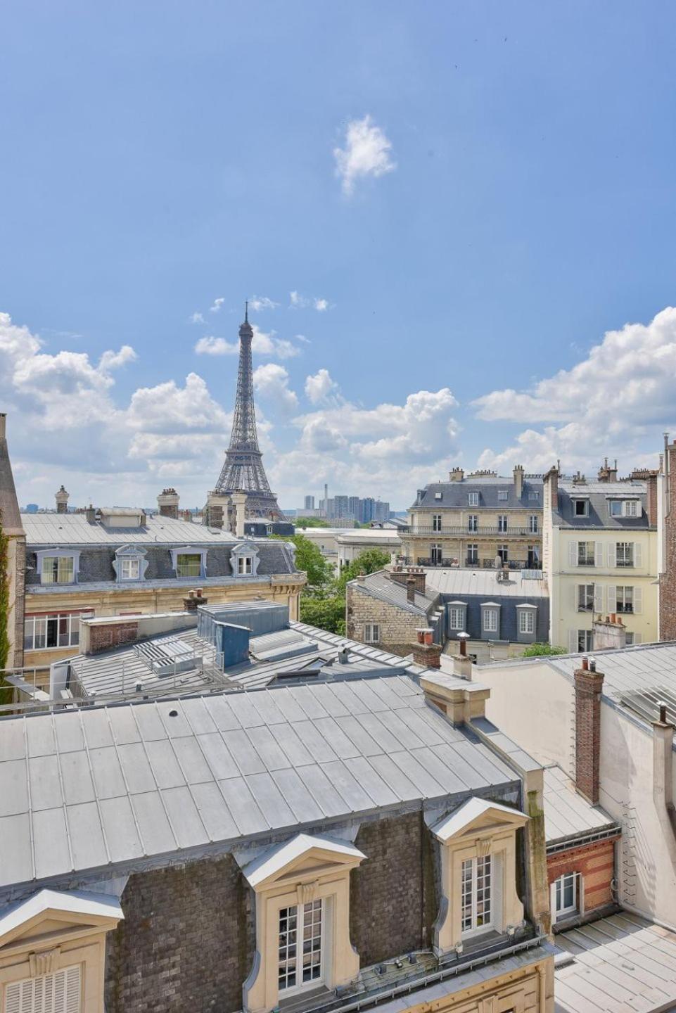 With A Panoramic View Of The Eiffel Tower *